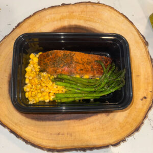Herb Grilled Salmon topped with teriyaki, with Corn and Asparagus